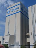 Allestimento insegna Gyproc su torre alta 48 m in Termoli